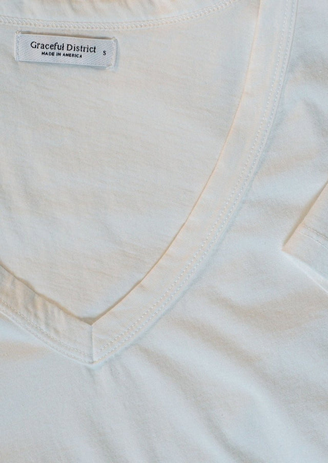 Robin V-Neck Tee in White - Veneka-Sustainable-Ethical-Tops-Graceful District Drop Ship